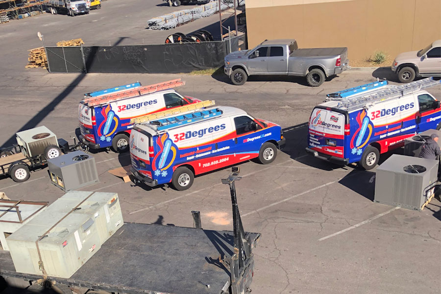 32 Degrees HVAC service vans parked with equipment in Las Vegas lot