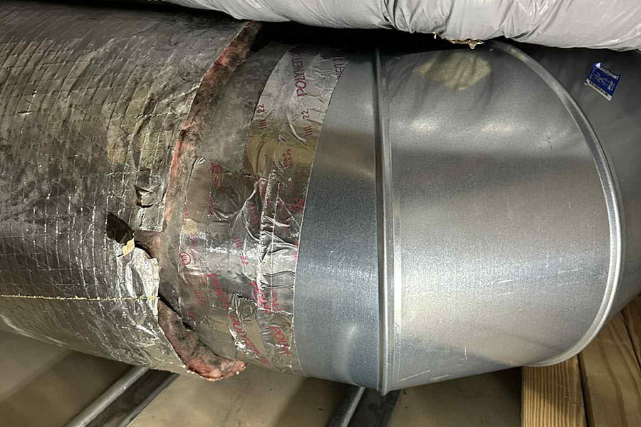 Damaged HVAC duct connection repaired in Las Vegas attic space