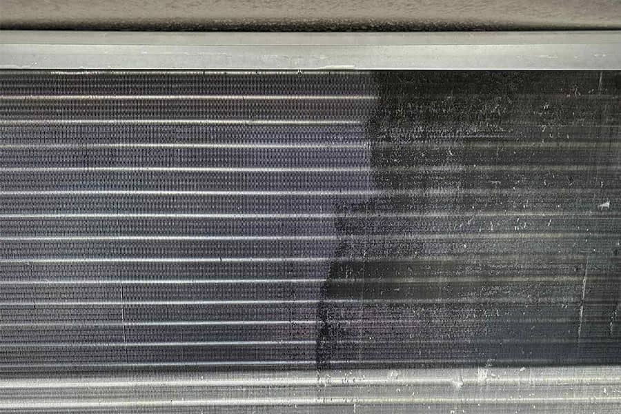 AC coil before and after cleaning showing dirt removal