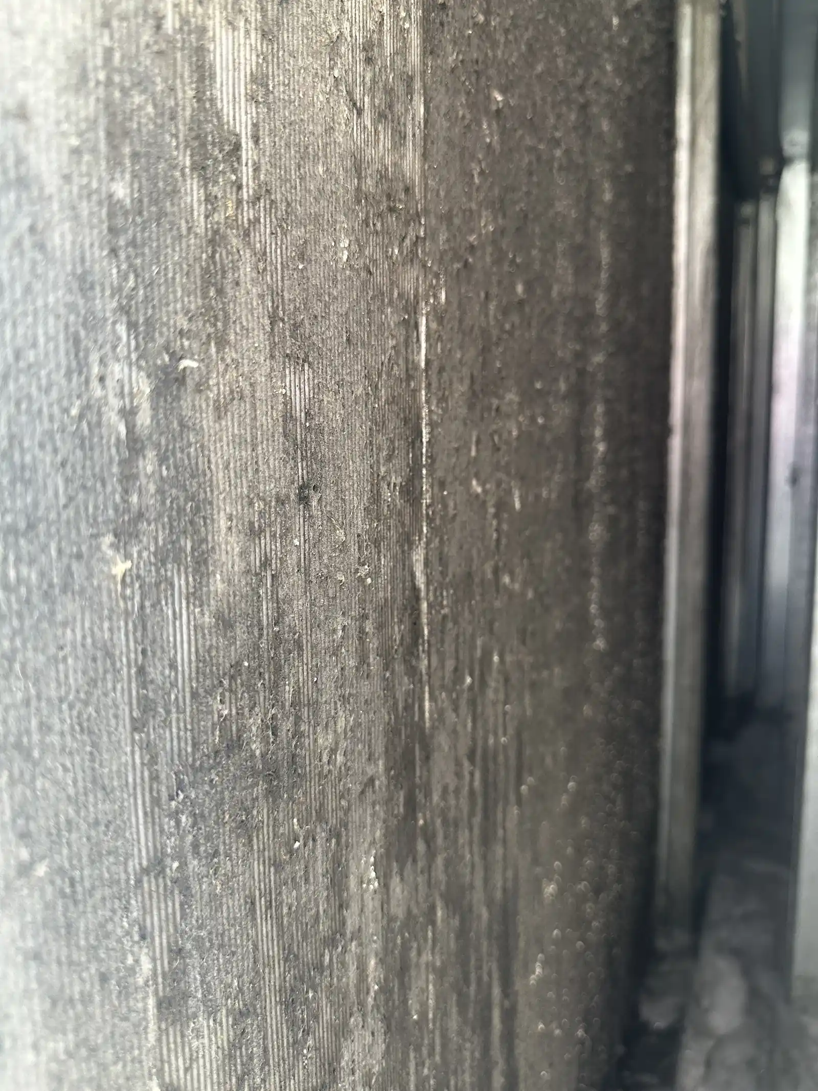Dirt buildup inside ductwork where unfiltered air has been pulled in